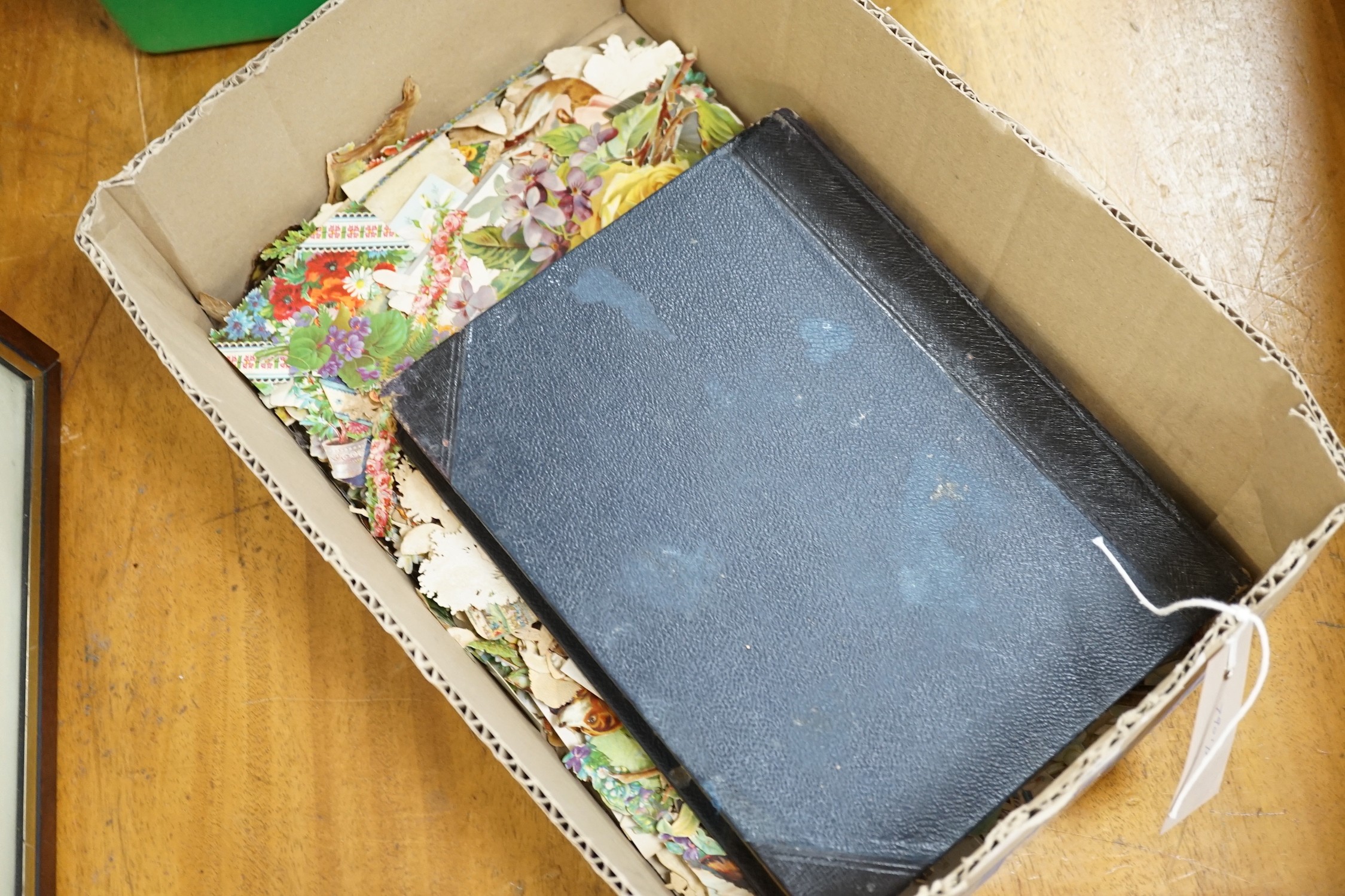 Two Victorian scrap albums and Victorian chromolithographic scraps